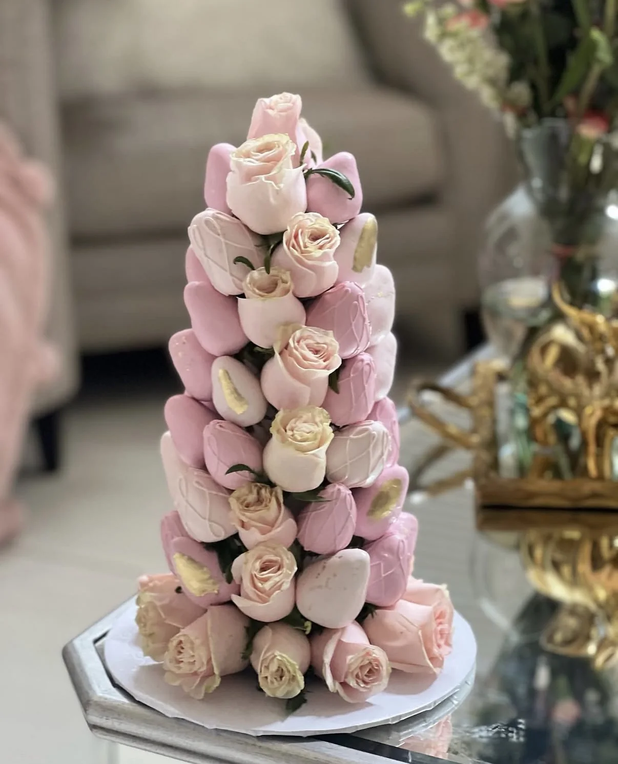 Pink rose and chocolate-covered strawberry tower